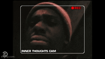 a man in a beanie is being recorded and says i want some crack