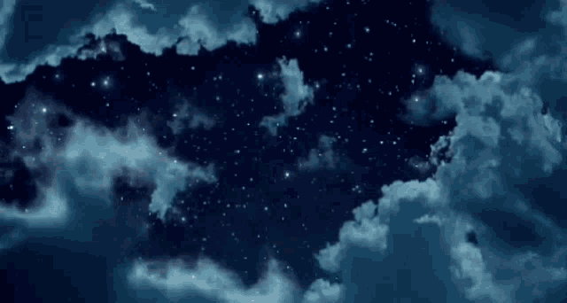 a night sky with lots of stars and clouds in it