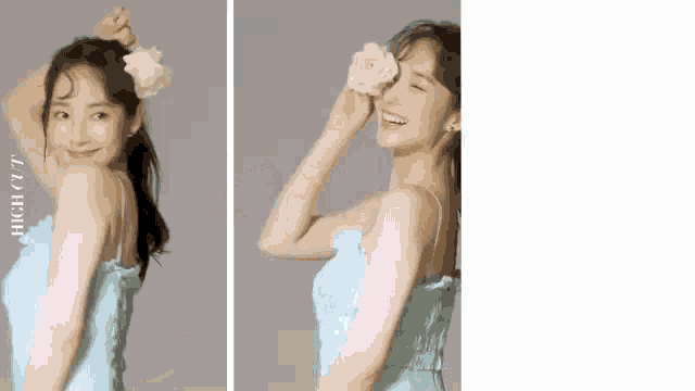a woman in a blue dress is holding a flower in her hair and smiling .