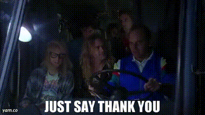 a man is driving a truck with a group of people behind him and the words `` just say thank you '' .