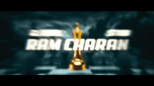 a blurred image of a ram charan award