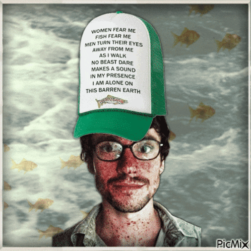 a picture of a man wearing a hat that says women fear me fish fear me men turn their eyes away from me