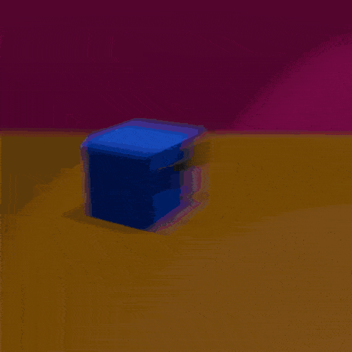 an orange ball sits on a table in front of a purple background