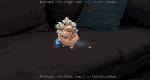 a large rock is sitting on a couch with the words developer test magic leap one device capture below it