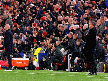 a gatorade cooler is sitting on the sidelines of a soccer field