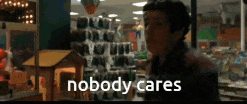 a person standing in a store with the words nobody cares written on the bottom