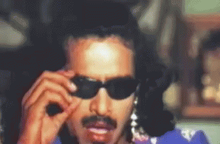 Telugu Sunglasses Down GIF - Telugu Sunglasses Down Brahmi GIFs