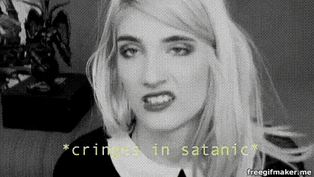 a woman is making a funny face in a black and white photo with the words `` cringe in satanic '' .
