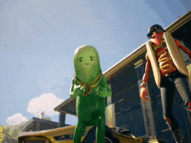 a pickle and a hot dog are dancing in front of a building