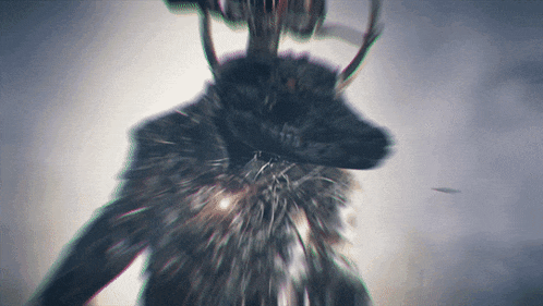 a blurry picture of a monster with horns