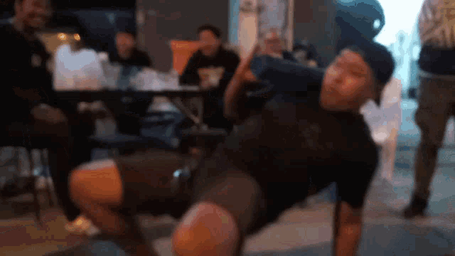 a blurry picture of a man doing a trick