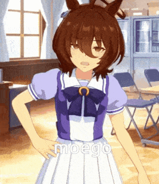 a girl with brown hair is standing in a room with her hands on her hips and the word moego written on the bottom