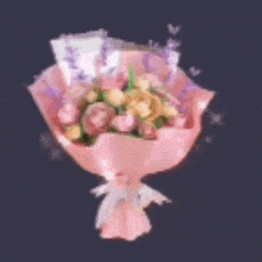 a bouquet of pink flowers with the number x999 on the bottom right
