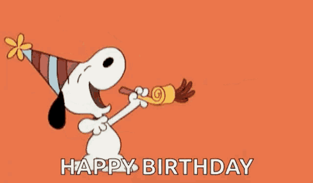 snoopy is wearing a party hat and blowing a party horn while saying happy birthday .