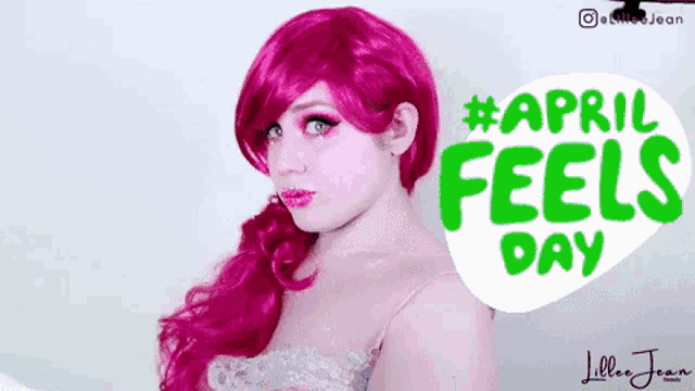 a woman with pink hair is standing in front of an april feels day sign
