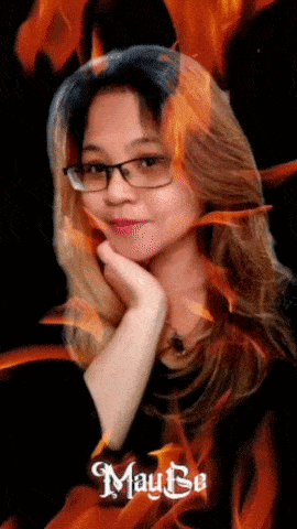 a woman wearing glasses and a black shirt with the word maybe on the bottom