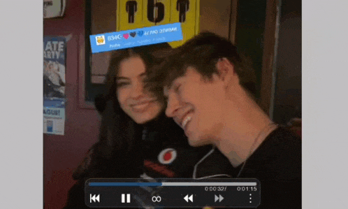 a video of a man and a woman is playing on a player