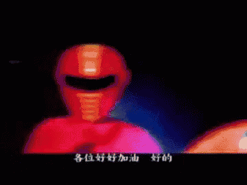 a man stands in front of a group of cartoon characters in a dark room