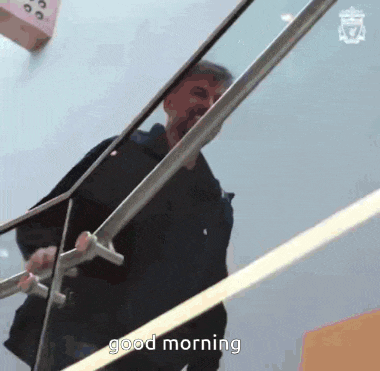a man standing on a set of stairs with the words " good morning " on the bottom