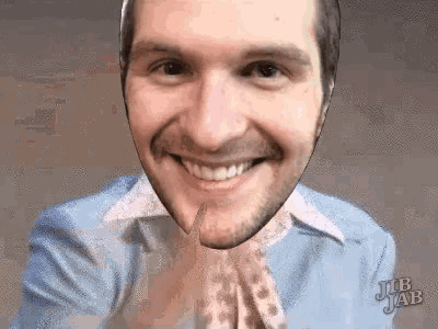 a close up of a man 's face with the words job jab on the bottom right