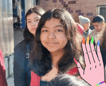a girl with a pink hand with nails painted in different colors