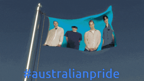 a blue flag with a picture of four men and the words #australianpride below it