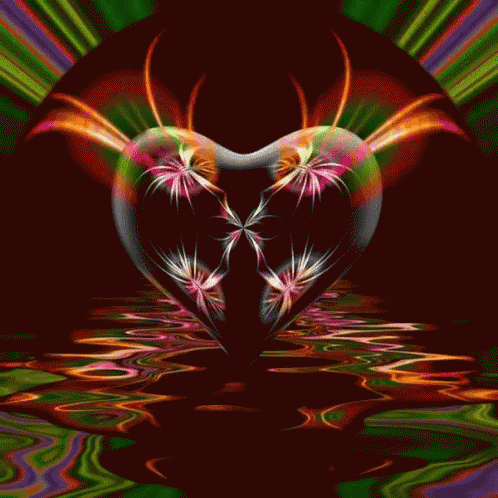 a colorful heart is floating in the water on a black background
