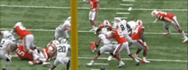 a football game is being played on a field with a lot of players .