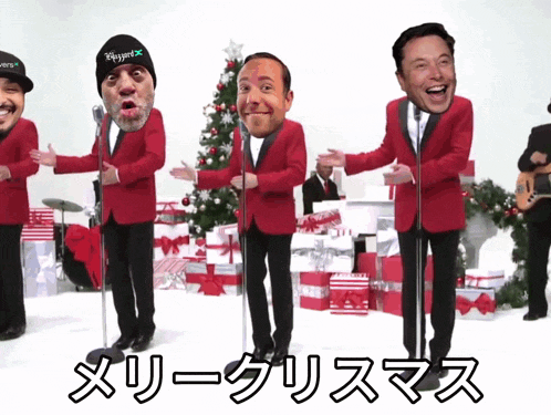 a group of men in red suits are singing merry christmas in a foreign language
