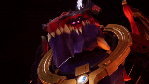 a close up of a red and purple monster with a gold circle around it