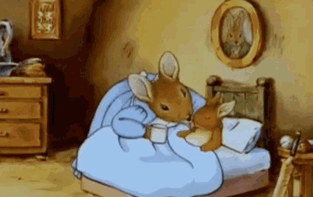 a cartoon of a mouse and a rabbit laying in bed