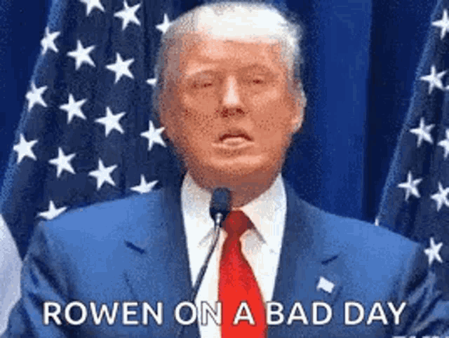 donald trump is giving a speech at a podium in front of an american flag .