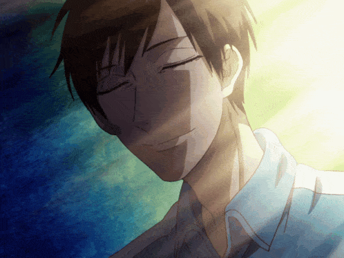 a close up of a man 's face with the sun shining on it