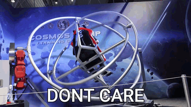 a sign that says cosmos training camp is behind a spinning machine