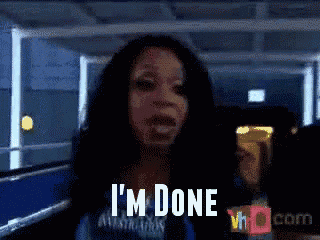 a woman says " i 'm done " in a blurred image
