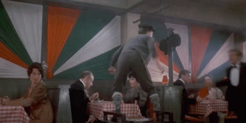 Johnny Dangerously Jump GIF - Johnny Dangerously Jump Fight GIFs