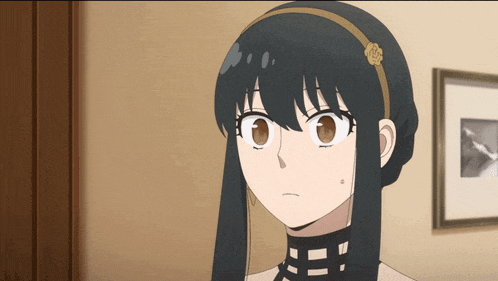 a girl with long black hair and a headband with a rose on it
