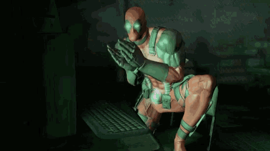a cartoon of deadpool sitting in front of a computer with the words " fukken saved " on the bottom