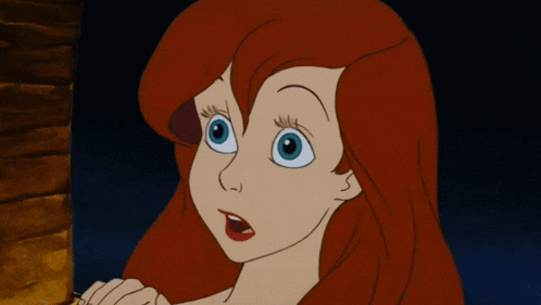 a cartoon of a girl with red hair and blue eyes