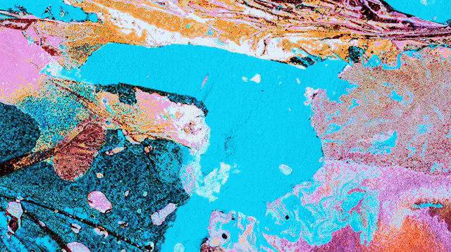a close up of a colorful painting with a blue and pink background