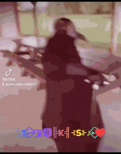 a tik tok video of a person holding a sword