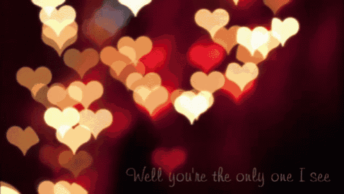 a blurred image of hearts with the words " well you 're the only one i see " at the bottom
