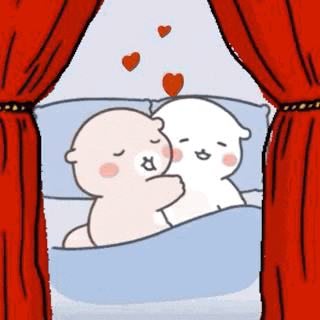 a couple of cartoon bears are hugging each other in bed .