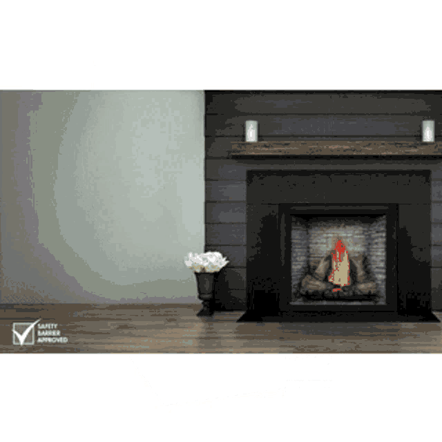 a fireplace with a vase of flowers in front of it and the words safety tested and approved on the bottom
