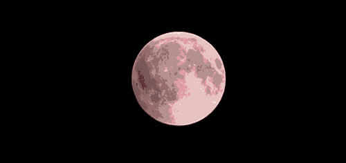 a red moon in the dark sky