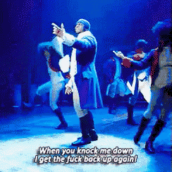 when you knock me down i get the fuck back up again written on a stage