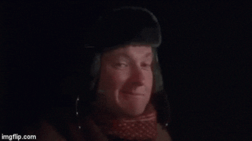 a man is wearing a hat and saying bingo .