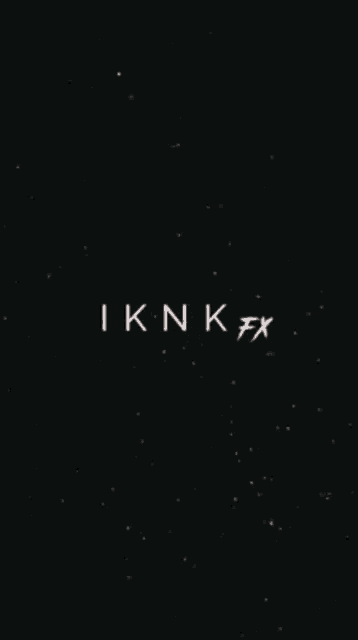 a white x on a black background with a lot of stars