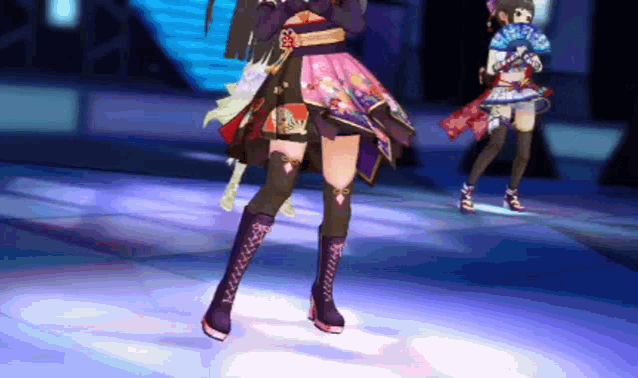 a girl in a kimono is dancing on a stage with other girls