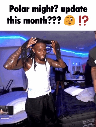 a man with dreadlocks is standing in front of a bed with the words polar might update this month